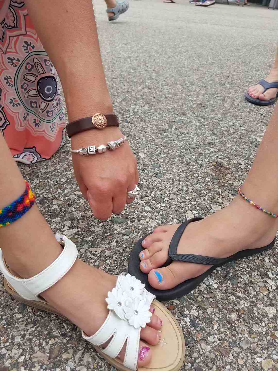 sandaled feet with anklets
